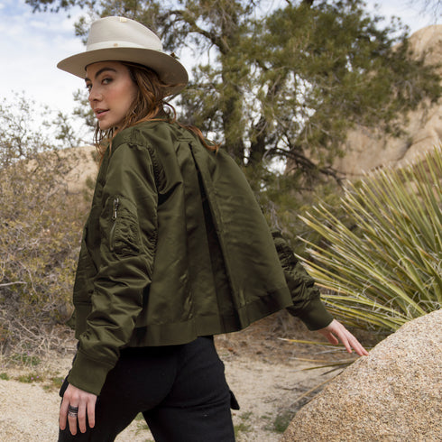Dominique Cohen limited edition bomber jacket, in olive,<br>shown as an optional jacket for shop the look > walkabout <span class='visuallyhidden'>Text, call 323-404-2959 for shopping assistance.</span> <span class='visuallyhidden'>Text, call 323-404-2959 for shopping assistance.</span>