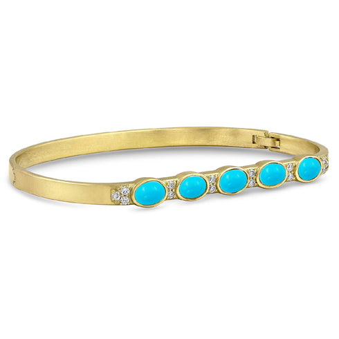 wardrobe with our gemstone ovals turquoise and diamond huggie bangle, which comes custom-fitted for that oh, so comfortable, no-roll fit <span class='visuallyhidden'>Call, text 323-404-2959 for shopping help.</span>