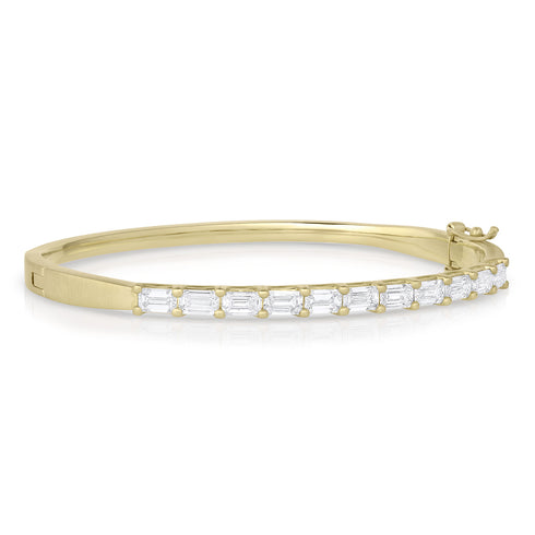 side view of custom-fitted Dominique Cohen emerald cut diamond no-roll bangle <span class='visuallyhidden'>Text, phone 323-404-2959 for shopping assistance.</span>