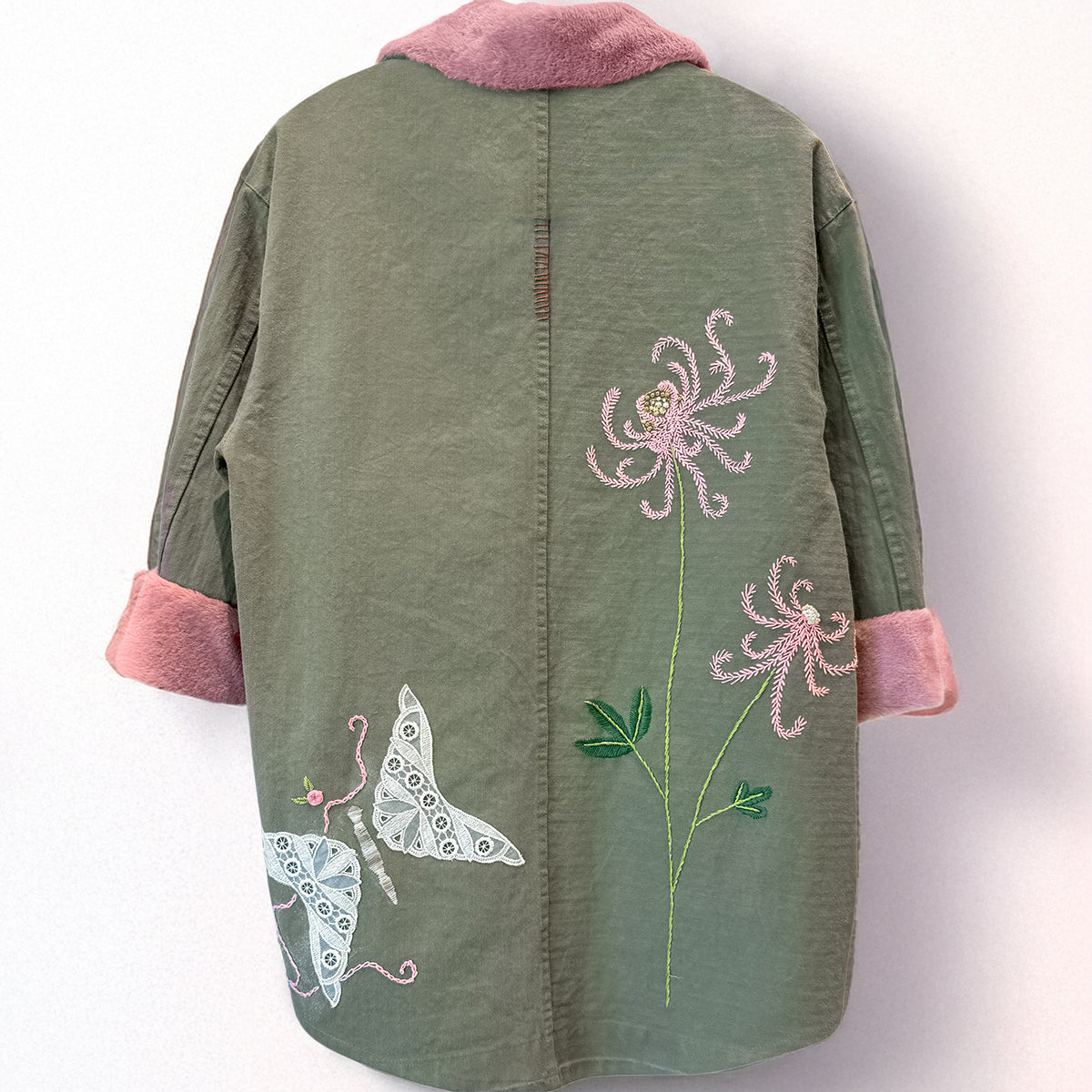 stylish vintage denim army jacket with hand-stitched floral