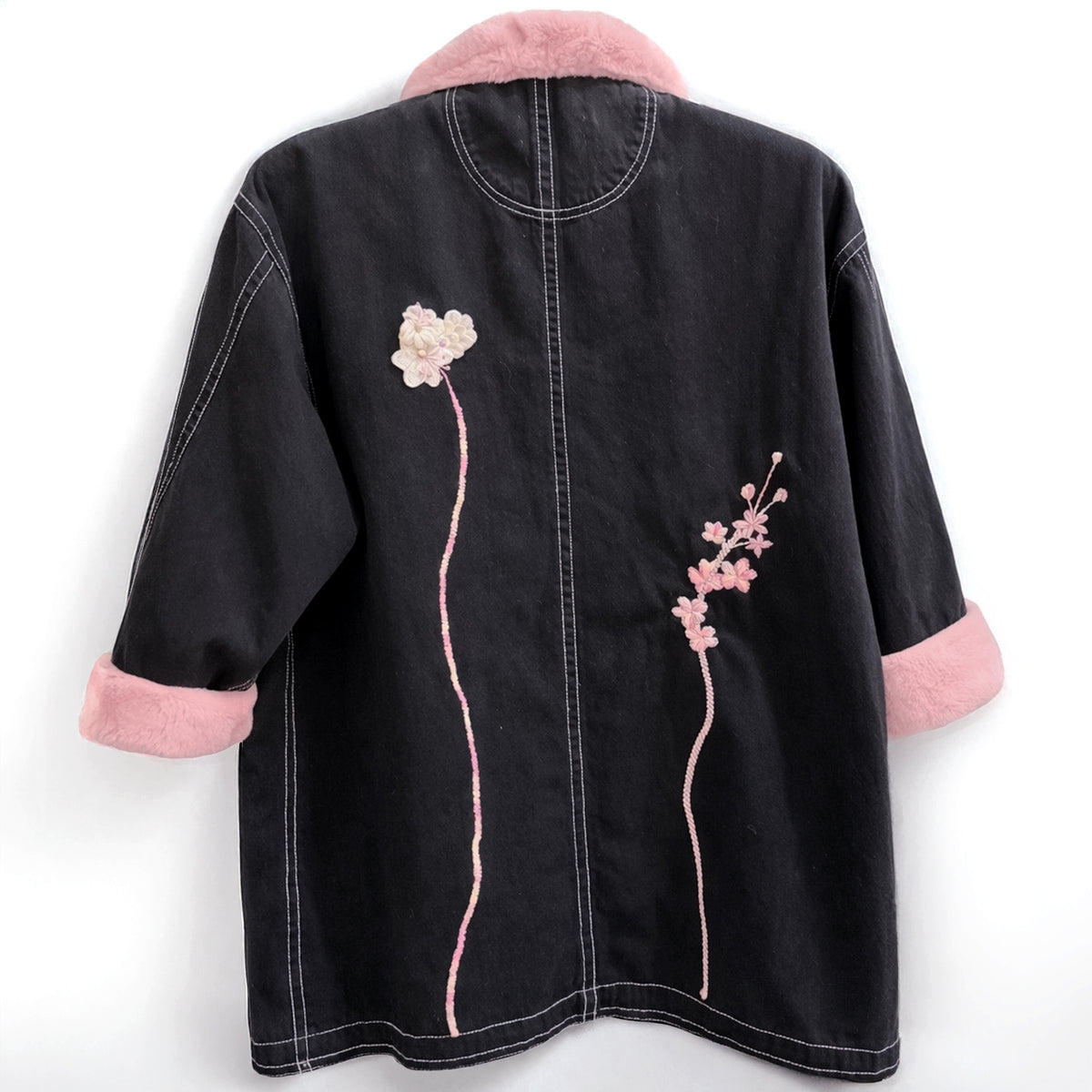 stylish vintage denim chore jacket with hand-stitched floral
