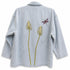 Dominique Cohen vintage denim chore jacket, updated with hand-stitched anthurium flowers + dragonfly<span class='visuallyhidden'>; shop help at 760-978-9297.</span>