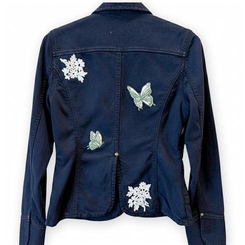 tailored lines, and adorned with floral + butterfly artistry<span class='visuallyhidden'>; shop help at 760-978-9297.</span>