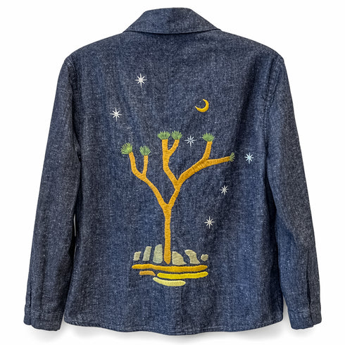 Dominique Cohen vintage denim chore jacket, updated with desert night embroidered artistry<span class='visuallyhidden'>; shop help at 760-978-9297.</span>