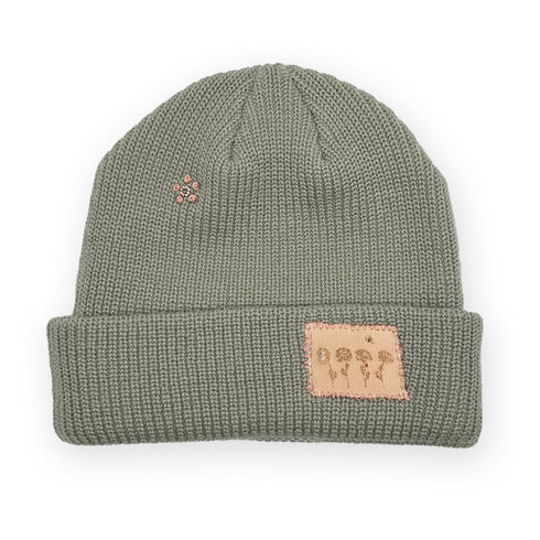 floral motif (front) in oatmeal with 18k gold plated flower pistil <span class='visuallyhidden'>Text, phone 323-404-2959 for shop help.</span>