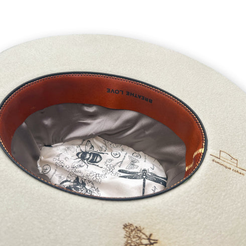 and the mantra Breathe Love burned into the leather sweatband<br>for daily inspiration <span class='visuallyhidden'>Call, text 323-404-2959 for shopping assistance</span>