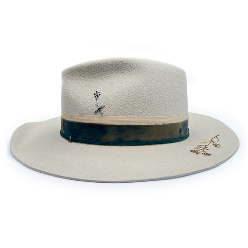 left profile, the beautiful hand-shaped flower blooming along her crown,<br>and blackened sterling textural rings adorning her suede <span class='visuallyhidden'>Call, text 323-404-2959 for shopping assistance</span>