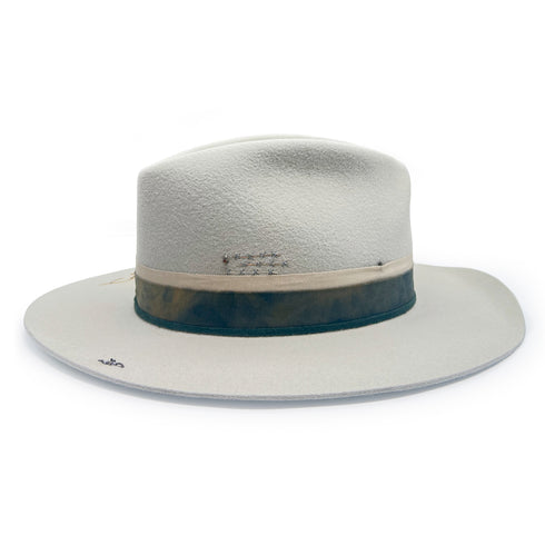 right profile view, with bezel set champagne diamond next to<br>a trio of silver wire hand-stitched accents,<br>an antiqued silver hat pin (tucked into ribbon),<br>and, sewn onto the brim, an antiqued sterling flower branch <span class='visuallyhidden'>Call, text 323-404-2959 for shopping assistance</span>