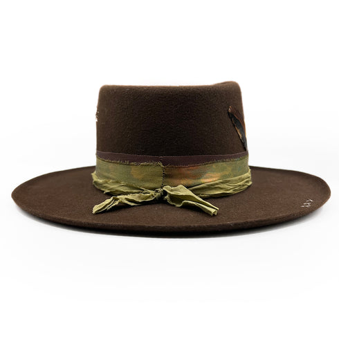 from behind, her artfully layered textiles<span class='visuallyhidden'>; shop help at 760-978-9297.</span>