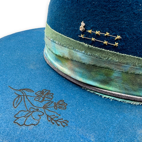 right side closeup of diamond bezel charm, floral burn, and textile beauty <span class='visuallyhidden'>Call, text 323-404-2959 for shop help.</span>