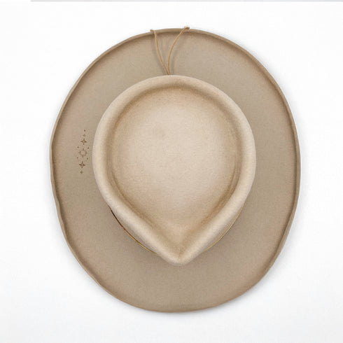 overhead, shining in artful lines and by-hand distress work<span class='visuallyhidden'>; 323-404-2959 for shop help.</span>