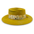 Sunny Side, a twist-front designer fedora in mustard with diamond-kissed gold, silk, and burn motif accents <span class='visuallyhidden'>Text, call 323-404-2959 for shop help.</span>