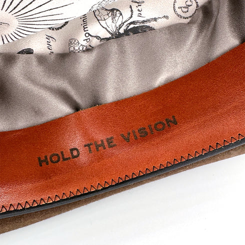 her leather sweatband, up close<span class='visuallyhidden'>; shop help at 760-978-9297.</span>