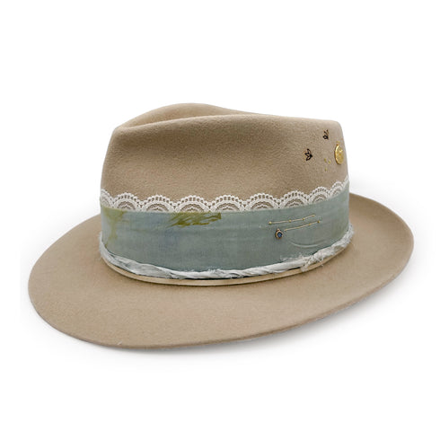 left side, angled forward, with the blue sapphire bezel charm at center, diamond-kissed dragonfly charm at rear <span class='visuallyhidden'>Call, text 323-404-2959 for shop help.</span>