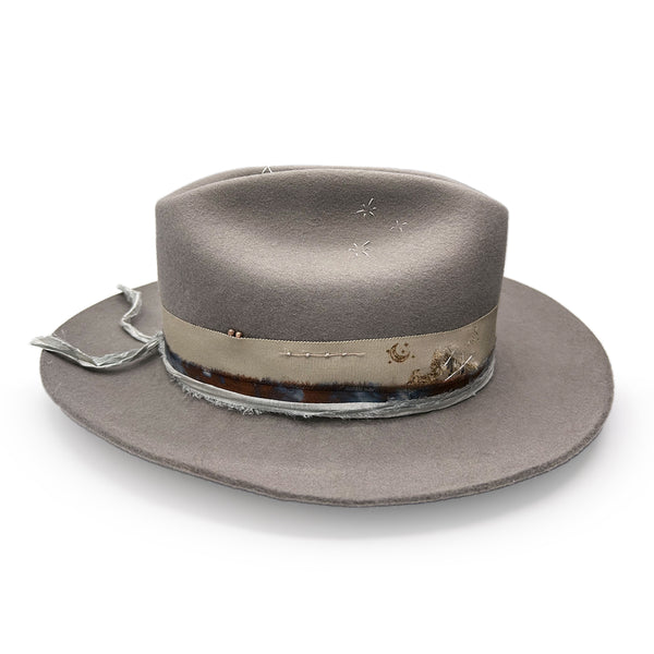 Silverstar, a Dominique Cohen crushable designer hat in ash grey with silver and rose gold accents<span class='visuallyhidden'>; shop help at 760-978-9297.</span>