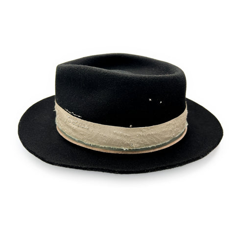 right profile includes a textural hat pin tucked into her hand-distressed grosgrain ribbon<span class='visuallyhidden'>; shop help at 760-978-9297.</span>