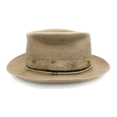 left profile includes three textural rings strung along her suede tie<span class='visuallyhidden'>; shop help at 760-978-9297.</span>