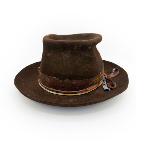 her stylish crown and upturned brim steal the show<span class='visuallyhidden'>; shop help at 760-978-9297.</span>