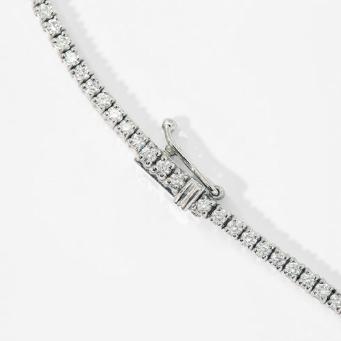 diamonds end to end, with a box clasp completing the circle <span class='visuallyhidden'>Call, text 323-404-2959 for shop help.</span>