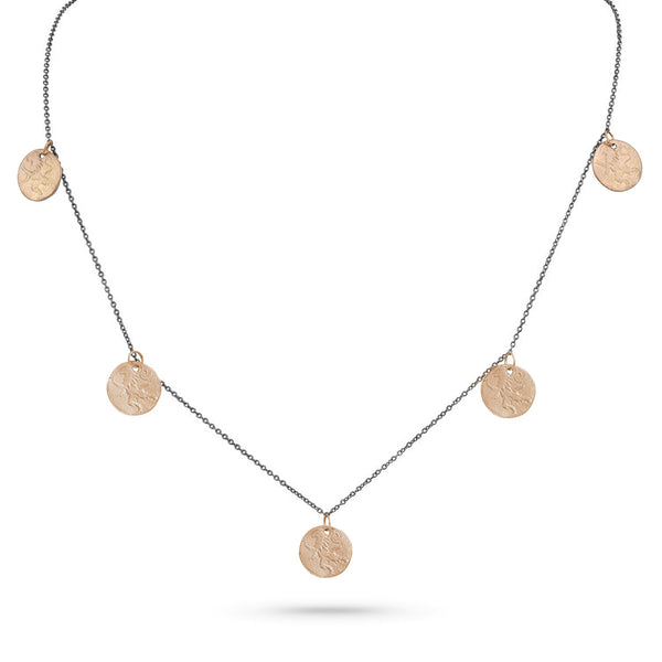 The original five-coin necklace by Dominique Cohen, as worn on The Newsroom, here in 18k rose gold paired with 18k black gold<span class='visuallyhidden'>; shop help at 760-978-9297.</span>