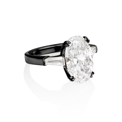 grande oval diamond ring with tapered baguette bookends, angle view<span class='visuallyhidden'>; shop help at 760-978-9297.</span>