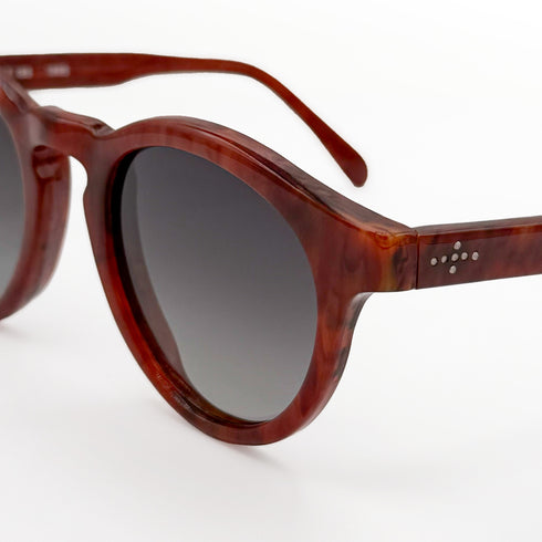 up close, Argos keyhold bridge round vintage sunglasses with champagne diamonds on arms<span class='visuallyhidden'>; shop help at 760-978-9297.</span>