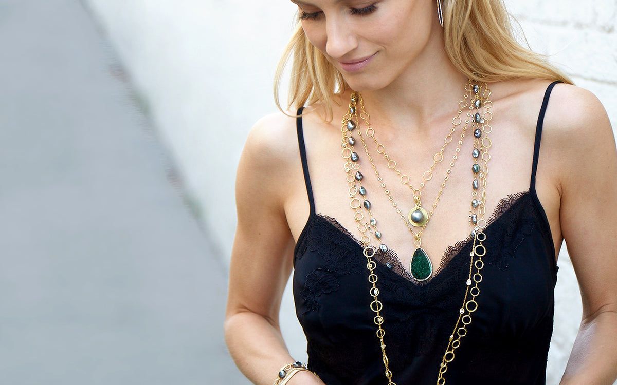 Woman wearing the Tahitian keshi pearl, diamond, gold jewelry collection Impromptu; shop the look; shopping assistance at 323-404-2959