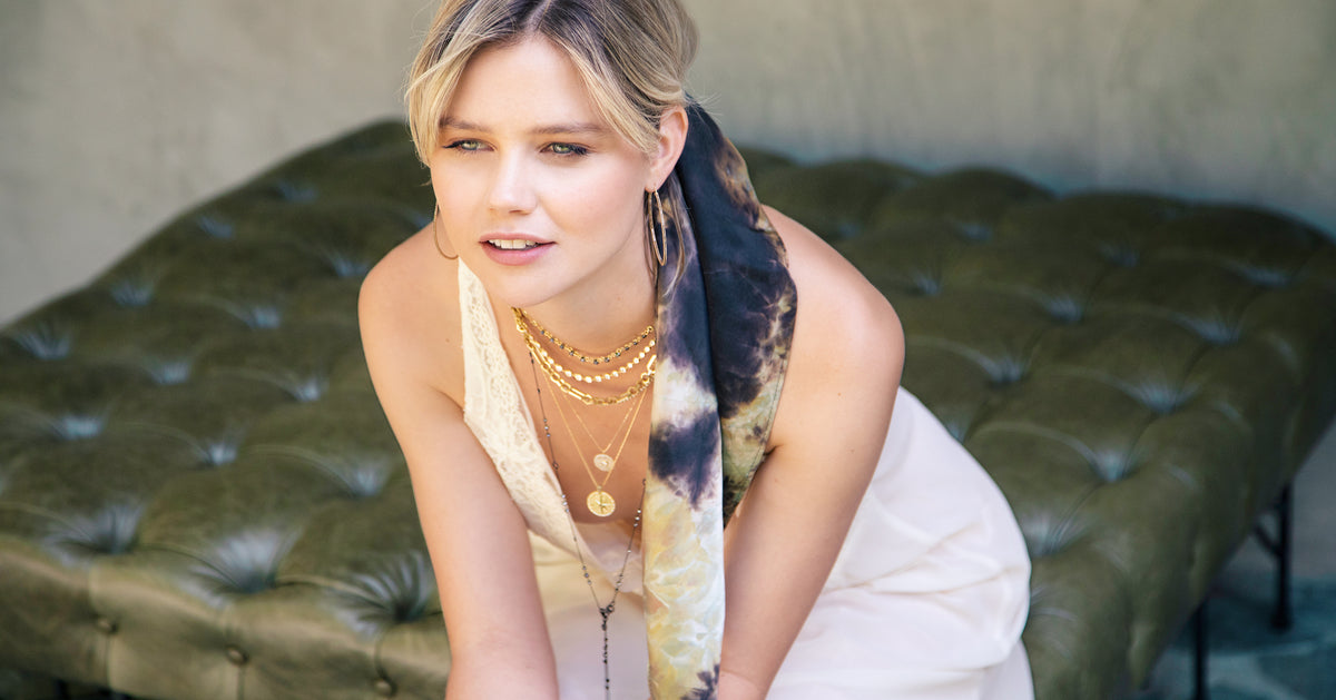 Dominique Cohen designer jewelry + silk apparel collection, Irresistible You, yellow gold, diamond, black diamond, black gold lifestyle luxury on beautiful woman