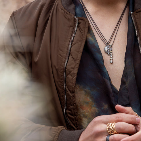 handsome on him as well as her,<br>say, with black gold jewelry + apparel from shop the look > vision quest <span class='visuallyhidden'>Text, phone 323-404-2959 for shopping assistance.</span>