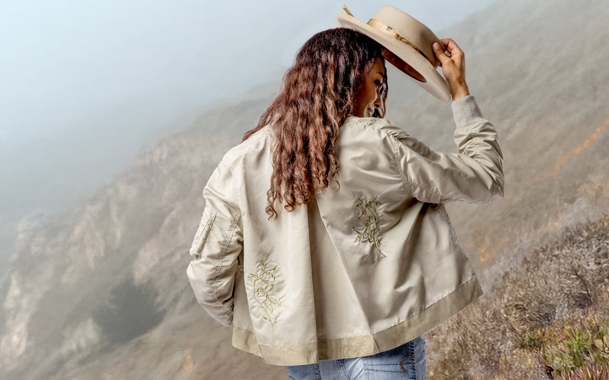 Hand-embroidered bespoke bomber jacket + custom designer hat from shop the look > flash golden, by Dominique Cohen; shop help at 760-978-9297