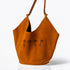 Dominique Cohen limited edition suede tote in camel with lotus flowers<span class='visuallyhidden'>; shopping help at 323-404-2959.</span>