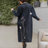 long denim coat with lace trim and gorgeous embroidery, from behind<span class='visuallyhidden'>; shop help at 760-978-9297.</span>