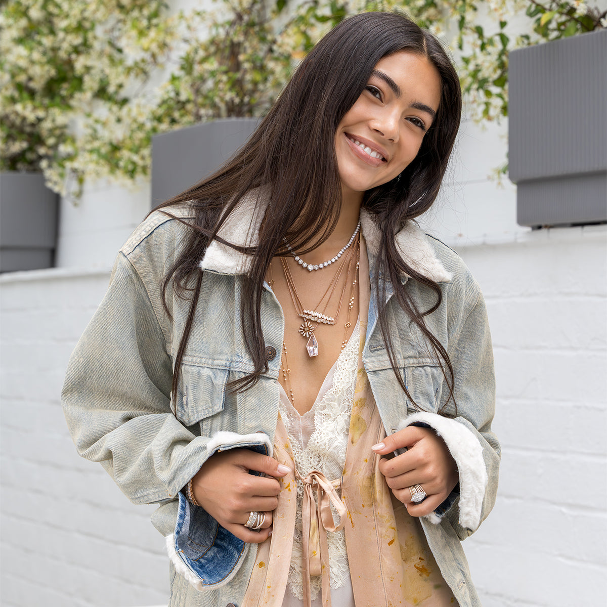 stylish light-wash vintage denim trucker jacket with hand-stitched