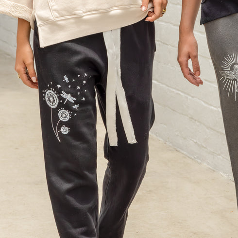 limited edition joggers in dandelions and dragonflies motif<span class='visuallyhidden'>; shop help at 760-978-9297.</span>