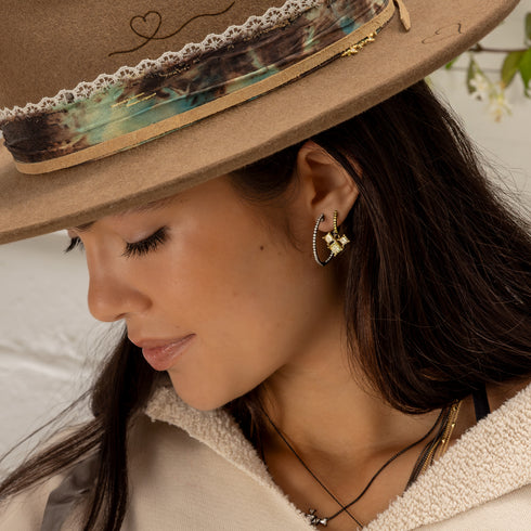 with our one-inch diamond hoops, in black gold;<br>ccoming this fall to shop the look > sundial<span class='visuallyhidden'>; shop help at 760-978-9297.</span>