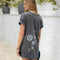 Dominique Cohen t-shirt dress in dandelions and dragonflies on grey<span class='visuallyhidden'>; shop help at 760-978-9297.</span>
