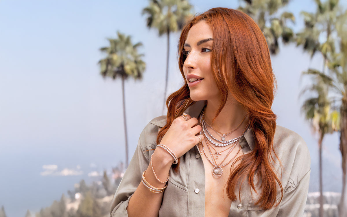 Carbon Flair, a diamond white gold and rose gold lifestyle designer jewelry and apparel collection by Dominique Cohen; shop help at 760-978-9297