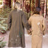 Dominique Cohen olive trench coat with one-of-a-kind in the mountains hand-embroidered artistry<span class='visuallyhidden'>; shop help at 760-978-9297.</span>