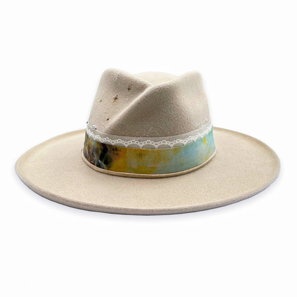 see the good, a stylish twist-brim designer hat<br>dressed in silk, lace, suede, and<br>sterling silver + blackened sterling diamond-kissed jewelry<span class='visuallyhidden'>Call or text 323-404-2959 if you need shopping assistance.</span>