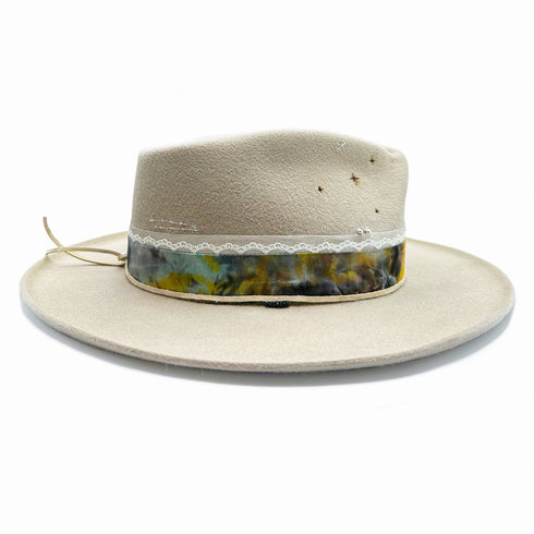 and, on her flip side, blackened sterling beads peaking out beneath her suede tie and hand-dyed silk <span class='visuallyhidden'>Call or text 323-404-2959 if you need shopping assistance.</span>