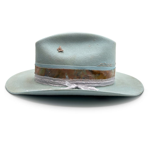 a beautiful balance of rugged and feminine beauties,<br>artfully brought together in a designer hat <span class='visuallyhidden'>Call or text 323-404-2959 if you need shopping assistance.</span>