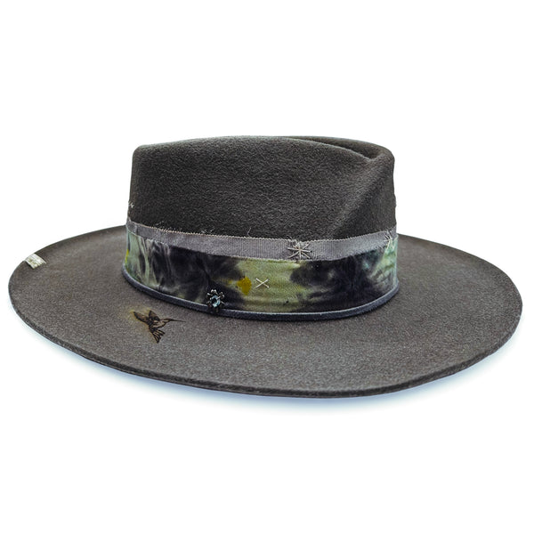the aquamarine, blacked sterling flower, and hummingbird burns, and softly-raw edge to the silk are merely three of the details making this hat a beauty unto her own<span class='visuallyhidden'>Call or text 323-404-2959 if you need shopping assistance.</span>