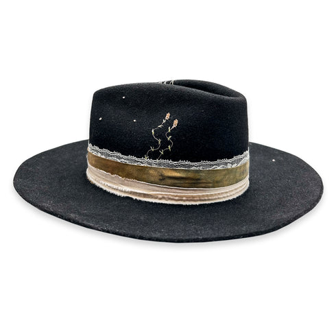 designer black felt hat, lightly distressed,<br>dressed in champagne diamonds, rose gold, and layered textiles <span class='visuallyhidden'>Call or text 323-404-2959 for shopping assistance</span>