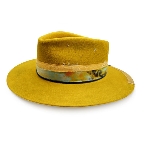 alluring layers of textiles, gold wire, jewelry, and hand-stitched accents <span class='visuallyhidden'>Call or text 323-404-2959 if you need shopping assistance.</span>