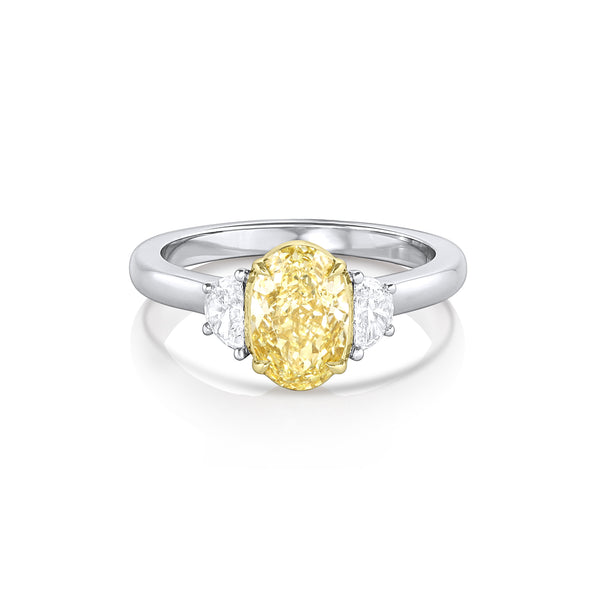 fancy light yellow oval diamond ring bookended in white diamonds;<br>yellow diamond set in yellow gold, rest of ring in platinum <span class='visuallyhidden'>Call or text 323-404-2959 if you need shopping assistance.</span>
