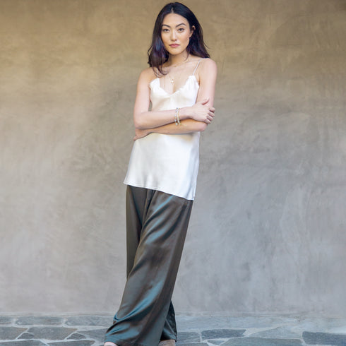 with our silk cami, in creme,<br>silk boxing pant, in slate,<br>diamond trios necklace, and paperclip chain, keshi pearl, and diamond tennis bracelets <span class='visuallyhidden'>Call or text 323-404-2959 if you need shopping assistance.</span>