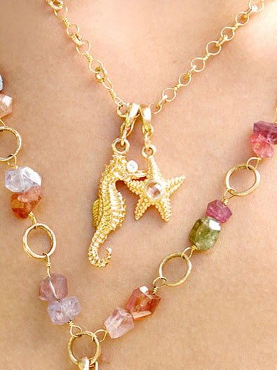 with our white topaz kissed starfish charm <span class='visuallyhidden'>Call or text 323-404-2959 if you need shopping assistance.</span>