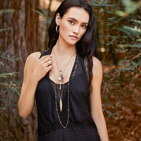 in black diamonds and blackened gold<br>layered with its larger sister in white diamonds and yellow gold<br>shop the look > moon lighting <span class='visuallyhidden'>Call, text 323-404-2959 for shopping help.</span>