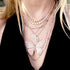 with our diamond carried pendant necklace, bezel bar choker, tennis choker, and trios station necklace <span class='visuallyhidden'>Call, text 323-404-2959 for shopping help.</span>