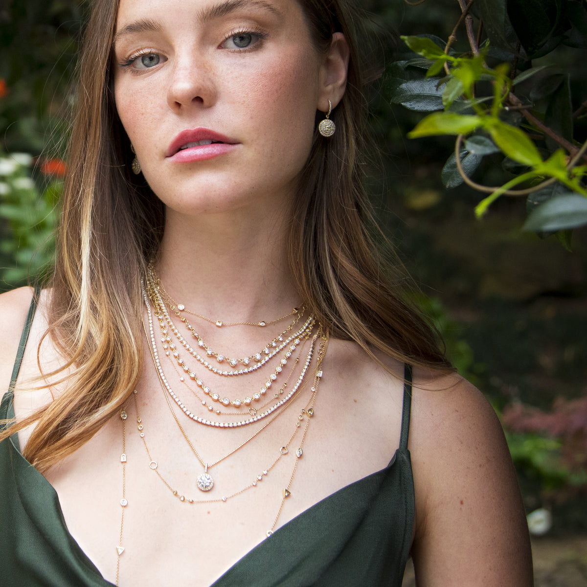 in yellow gold, tiered with close cousins (from top)<br>prong-set choker, 5.5ct tennis choker, graduated diamonds tennis choker, 7.5ct tennis choker, and friends<br>coming this fall to shop the look <span class='visuallyhidden'>Call, text 323-404-2959 for shopping help.</span>